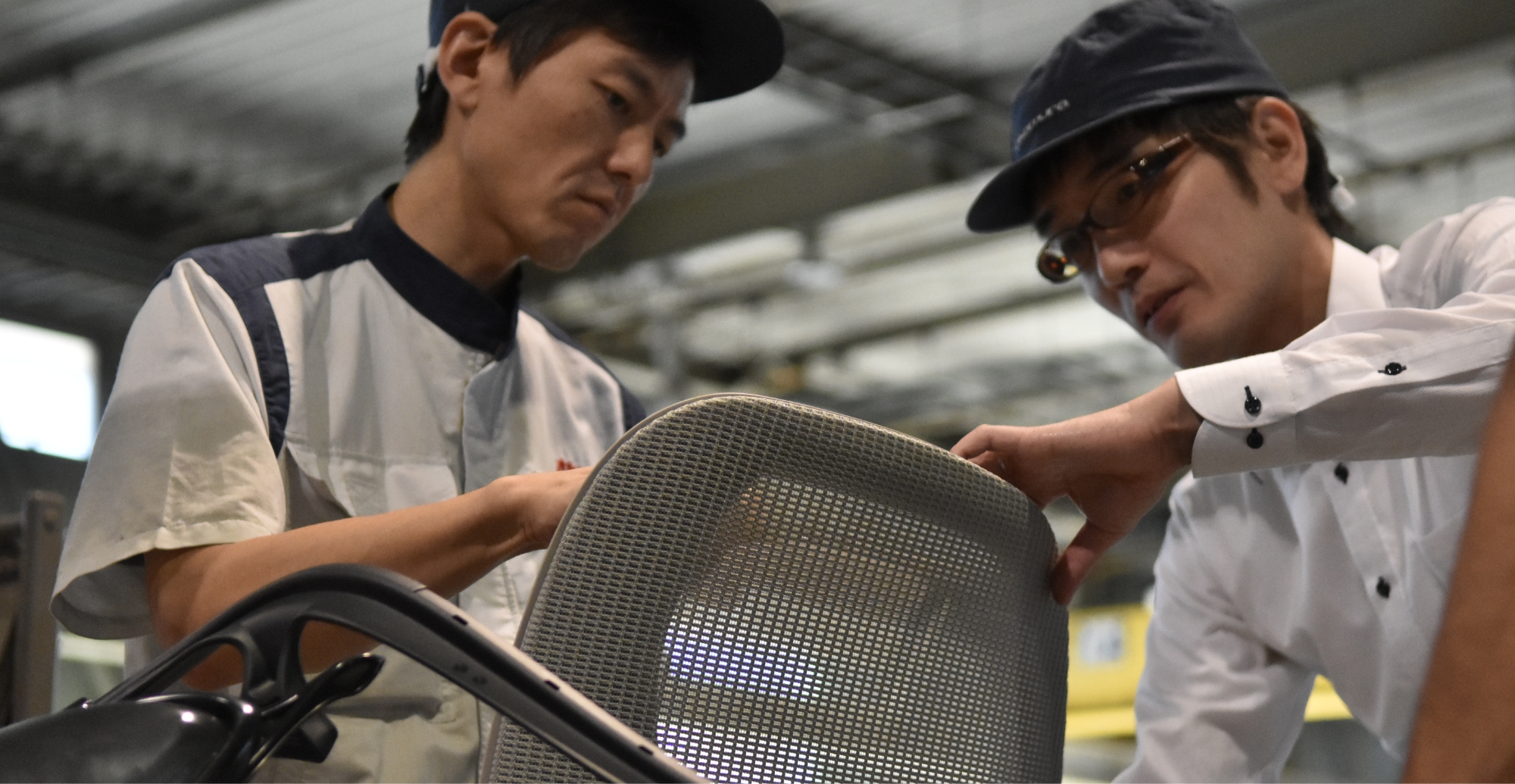 Checking mesh tension and its workability with a prototype.
