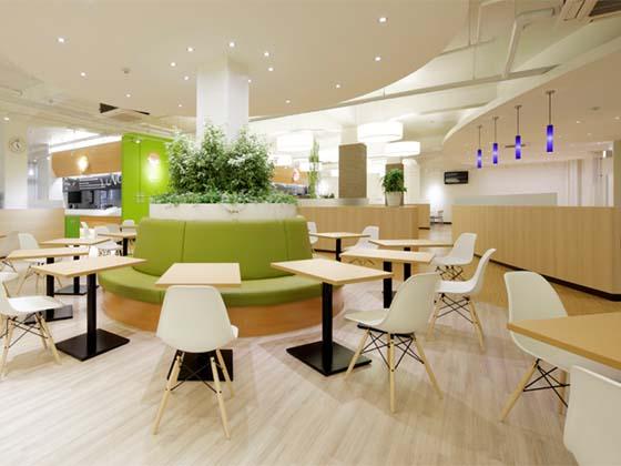 Oki Electric Industry Co., Ltd./【The central seats on the first floor】We designed table seats placed in a circle around a pillar.