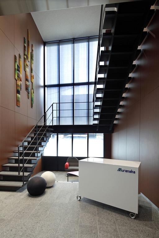 Muranaka Medical Instruments Co., Ltd./【Visitor entrance 1】The high ceiling and art combine to create a memorable entrance.